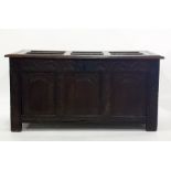 18th century oak coffer with three carved arched panels to the front, on stile supports