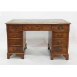 19th century mahogany pedestal desk with green leather inset top, nine assorted drawers, raised on