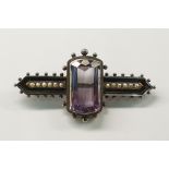 Late Victorian style amethyst-coloured stone and seedpearl bar brooch