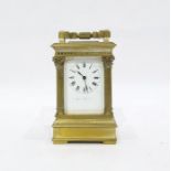 French brass carriage clock with Roman numerals to the enamel dial, marked 'Janetti Padre &