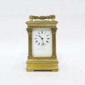 French brass carriage clock with Roman numerals to the enamel dial, marked 'Janetti Padre &