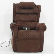 Modern lift and recline electric armchair in plum-coloured upholstery