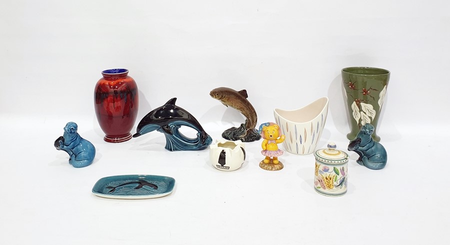 Poole Pottery model dolphin, two Poole Pottery model otters, two Poole Pottery vases, various, and a