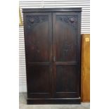 20th century oak wardrobe raised on plinth base, 201cm high