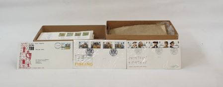 Quantity of British and World First Day Covers in a bag and a box, together with a box and