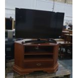 LG 43" Ultra HD Smart TV, model No. 43UJ634V on wood effect TV stand