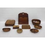 Large quantity of treen including carved salad bowls, wooden trays, letter rack, slide rule, fruit