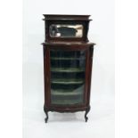 19th century mahogany bowfront music cabinet, the mirrored superstructure back above the glazed