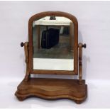 19th century mahogany dressing table mirror, the arched top mirror on a serpentine fronted base