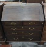 George III oak bureau with sloping fall front fitted interior with cupboard, drawers and