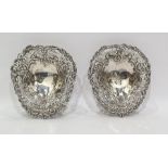 Pair of late Victorian heart-shaped bonbon dishes with elaborate pierced fretwork borders, C-