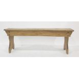 Late 19th/early 20th century pine bench on shaped end supports, 39cm x 48cm