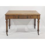 Late Victorian oak single drawer side table, the rectangular top with ogee moulded edge above the