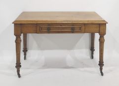 Late Victorian oak single drawer side table, the rectangular top with ogee moulded edge above the