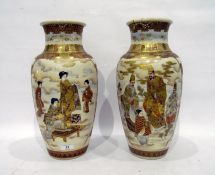 Pair of late 19th century Japanese Satsuma baluster vases, painted and richly gilt with figures