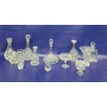 Cut glass spirit decanter, club-shaped with silver mounted neck and the cut mushroom-shaped stopper,