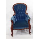 Victorian armchair in blue ground button-back upholstery, serpentine front rail, cabriole supports