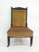 19th century walnut framed salon chair on turned front legs to castors