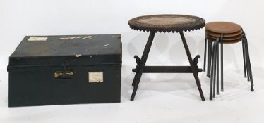 19th century carved oak oval top table on trestle-style supports, a tin trunk and a set of four