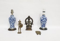 Two similar Chinese porcelain blue and white baluster vases mounted as lamps, four-character