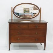 Late 19th/early 20th century dressing chest with oval mirror, two short above two long drawers, on