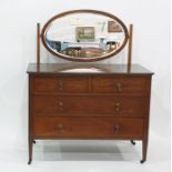 Late 19th/early 20th century dressing chest with oval mirror, two short above two long drawers, on