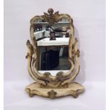 Dressing table swing mirror in the rococo taste, the whole surmounted by cherub, all painted cream