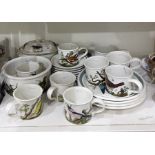Quantity of Portmeirion pottery tableware in various patterns including birds and flowers viz;