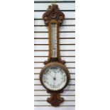 Oak cased aneroid barometer/thermometer marked 'Sidric'