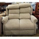 Small two-seater modern sofa in oatmeal ground foliate upholstery