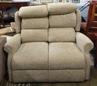 Small two-seater modern sofa in oatmeal ground foliate upholstery