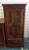 Modern Eastern hardwood sideboard with three central drawers flanked by latticework fronted single