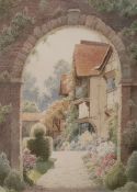 Herbert George Watercolour drawing Timber framed house seen through a stone archway, signed lower