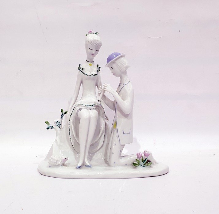 Rosenthal porcelain group of a seated girl with kneeling suitor, 22cm high