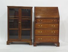 20th century oak bureau of four drawers and a glazed cabinet (2)