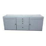 20th century sideboard of four central drawers flanked by cupboard doors, painted duck-egg blue,