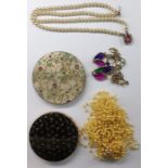 Small quantity of costume jewellery to include bead necklaces, gilt metal and black lacquer powder