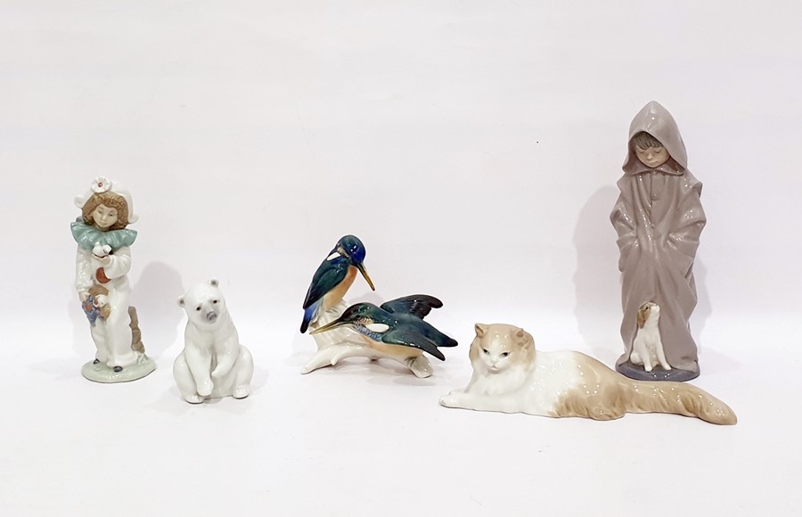 Lladro porcelain model Polar bear, seated, two Nao figures of children and a Nao seated cat,