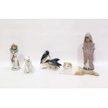 Lladro porcelain model Polar bear, seated, two Nao figures of children and a Nao seated cat,