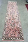 Modern pink ground runner, foliate decoration, 315cm x 84cm