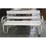 White painted garden bench with scroll iron end supports