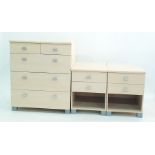 Suite of bedroom furniture to include bedside cabinets and two chests of two short over three long