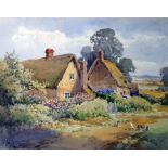 Henry John Sylvester Stannard (1870-1951)  Watercolour drawing  Thatched cottages by lane, signed