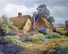 Henry John Sylvester Stannard (1870-1951)  Watercolour drawing  Thatched cottages by lane, signed