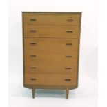 Mid 20th century bedroom furniture comprising teak chest of six drawers, dressing table and two