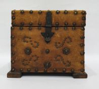 Brown leather and brass studded box opening to reveal assorted magic lantern slides of Victorian and