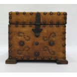 Brown leather and brass studded box opening to reveal assorted magic lantern slides of Victorian and