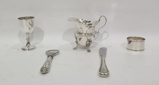 Silver cream jug with cut card borders, raised on paw feet, Birmingham 1905, height 10cm, 4oz