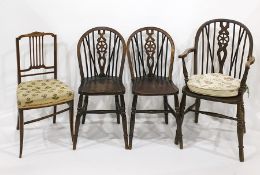 Wheelback carver chair, two further wheelback chairs and a bedroom chair (4)