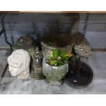 Seven composite garden planters and ornaments plus cast iron boot-scraper